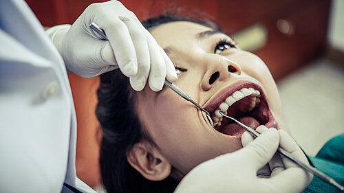 Dentist with patient